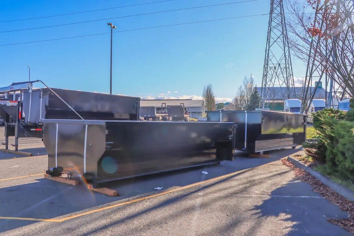 Roll-off dumpster ready for waste disposal at job site for Yard Waste Dumpster Rental in Ridgefield